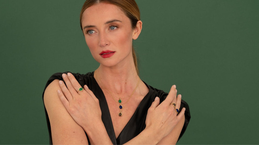How to layer a birthstone necklace with other pendants