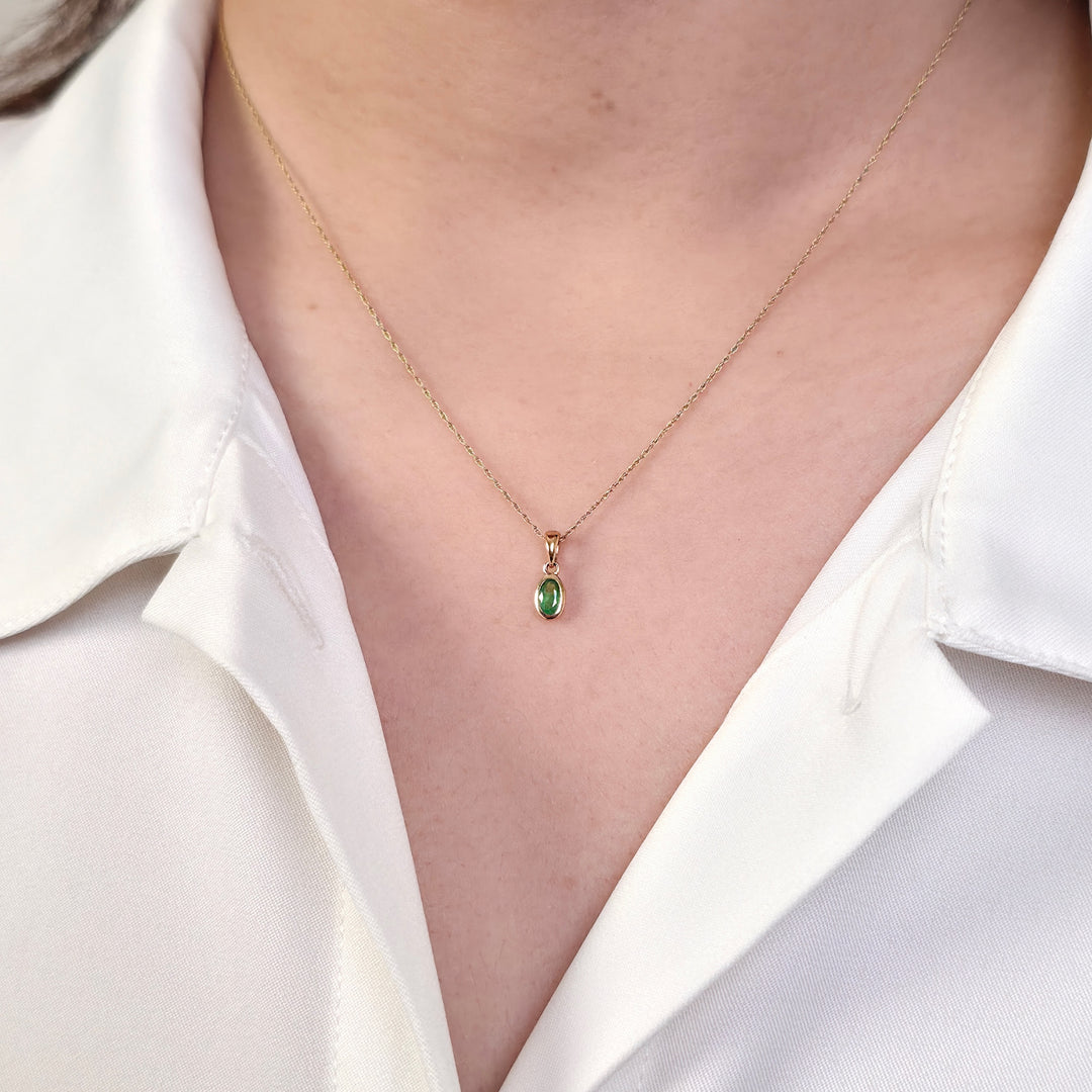 Classic Oval Emerald Pendant in 9ct Yellow Gold