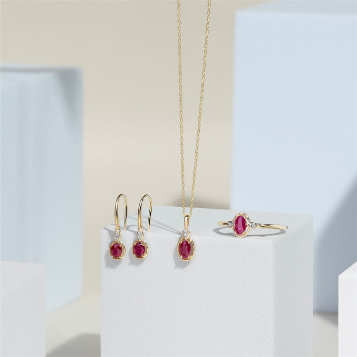 Classic Oval Ruby & Round Diamond Ring In 9ct Yellow Gold