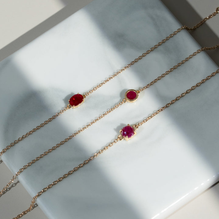 Classic Single Stone Round Ruby Milgrain Bracelet in 9ct Yellow Gold