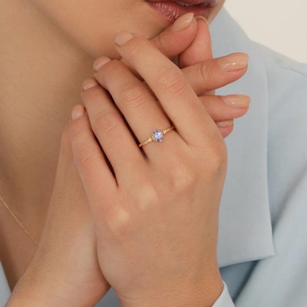 Classic Oval Tanzanite & Diamond Ring in 9ct Yellow Gold