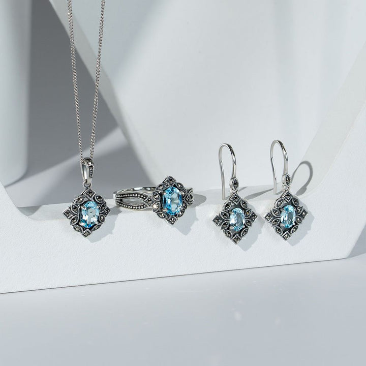 Art Deco Style Oval Blue Topaz & Marcasite Pendant Necklace in Sterling Silver
